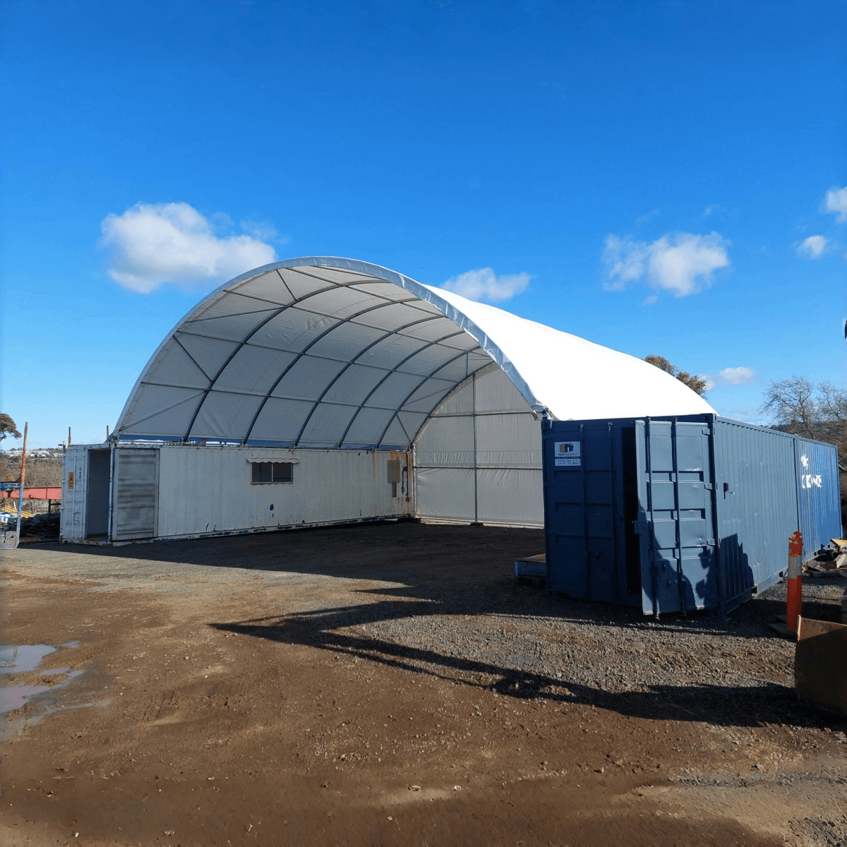40' × 40' × 15' Double-Truss Container Shelter with Closed Rear Panel